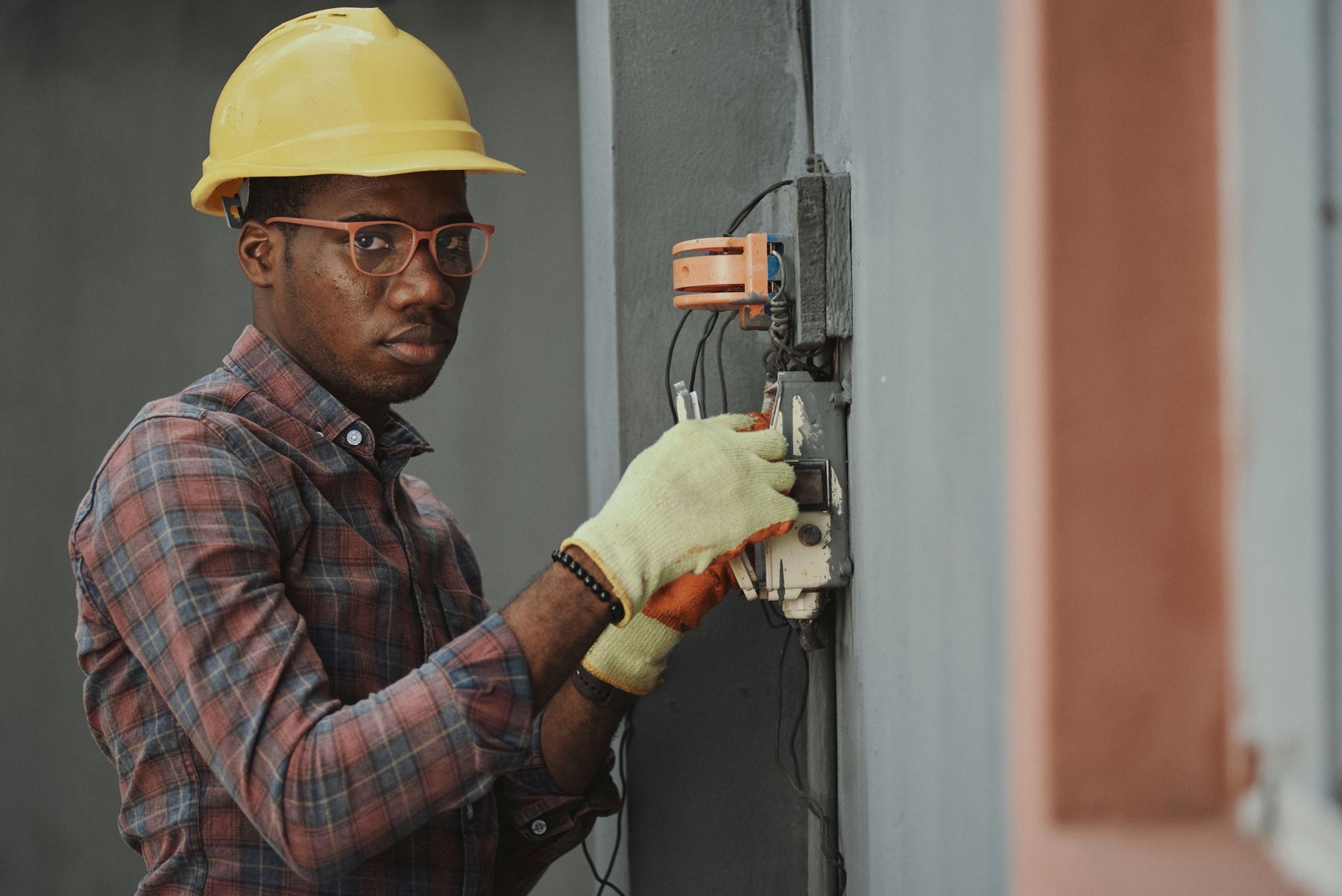 Qualified electrician carrying out an installation in a residential property